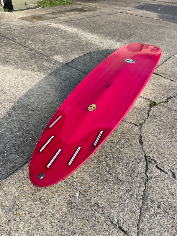 red 5 fin longboard surfboard
