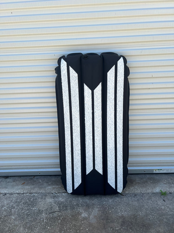 Black and White inflatable surf body mat