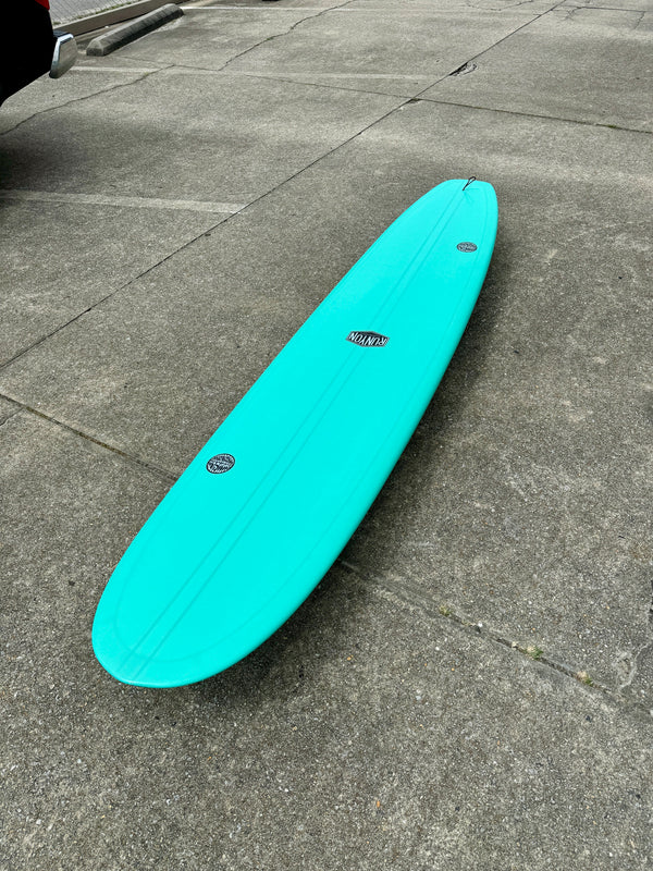 blue longboard surfboard
