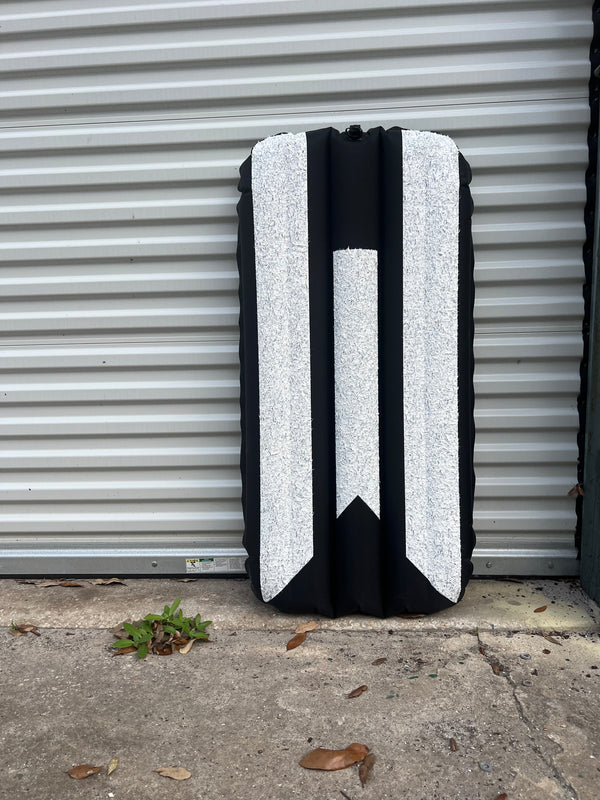 black and white inflatable surf mat