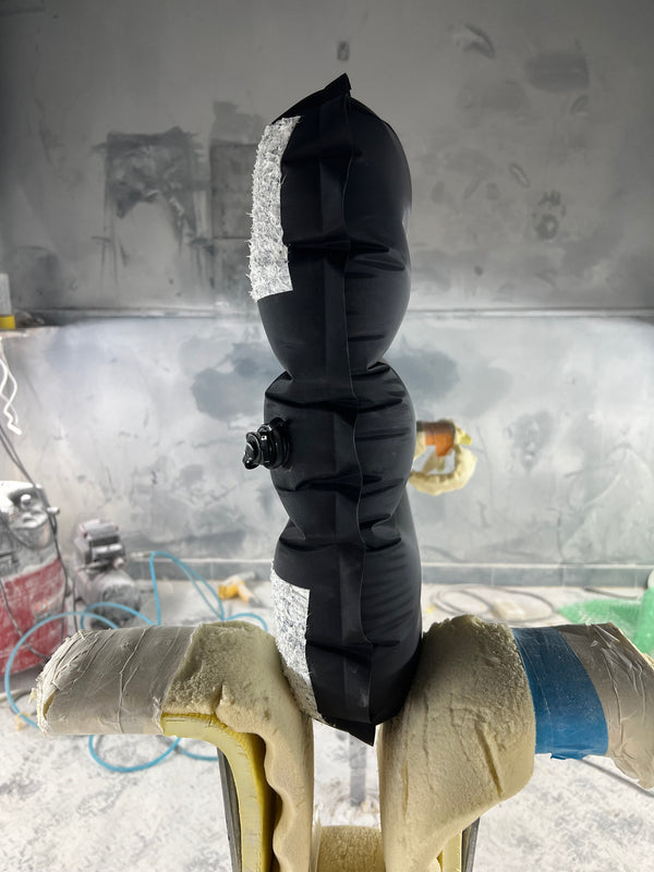 black and white inflatable surf mat