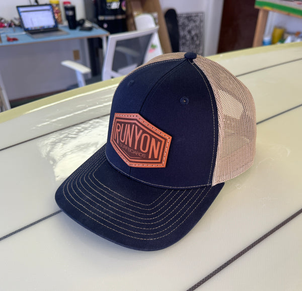 Navy trucker hat with leather patch
