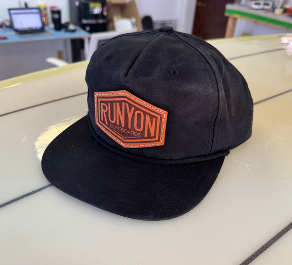 navy hat with leather patch logo