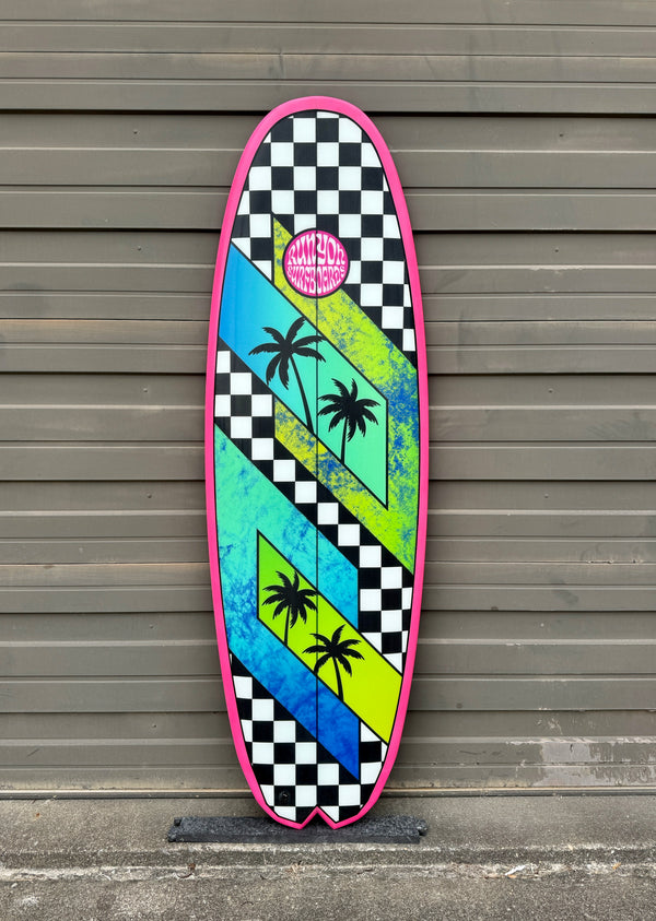 pink multi pattern shortboard surfboard