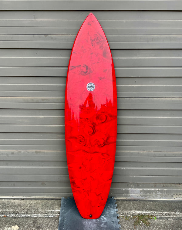red resin swirl surfboard