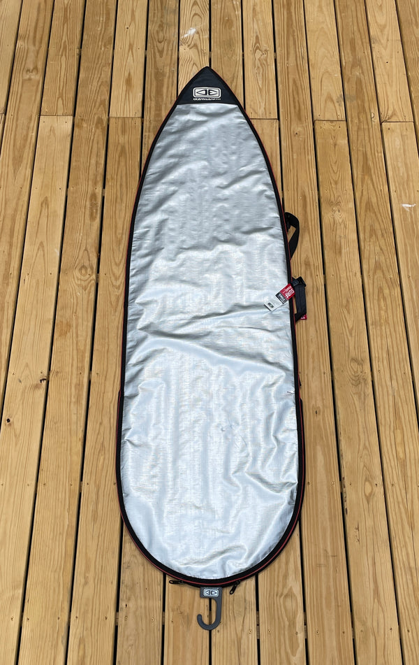 silver surfboard bag