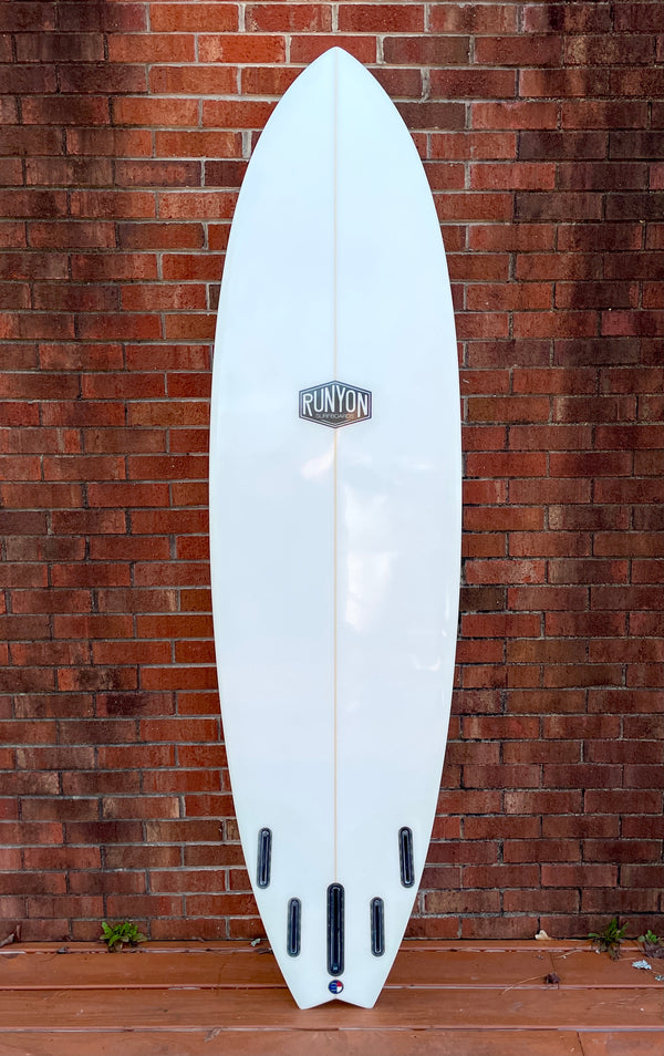 white 5 fin surfboard swallow tail