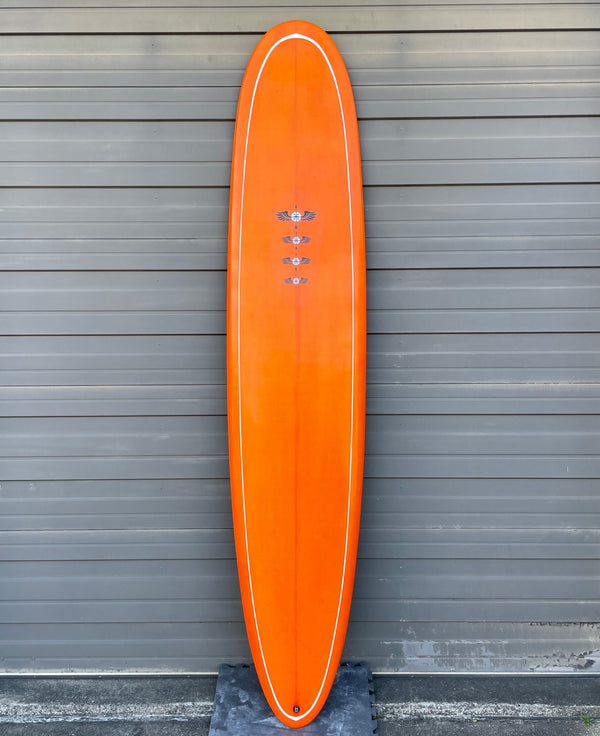 orange longboard surfboard