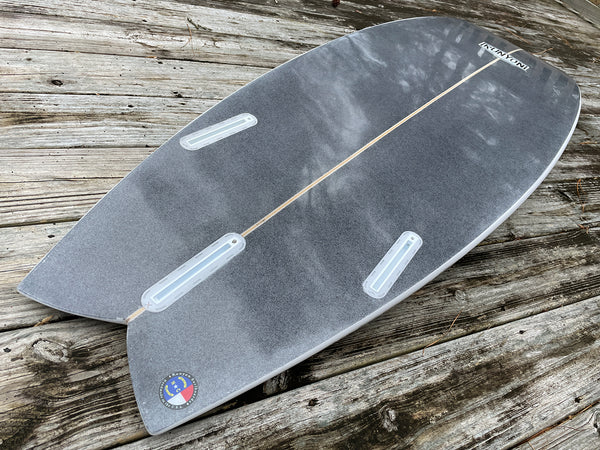 black shortboard swallow tail surfboard