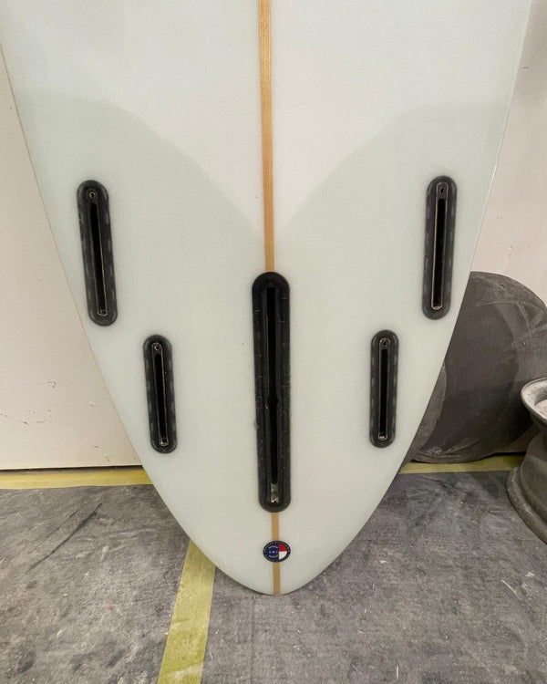 Tail of Glider Longboard. 4 + 1 Future Fin Setup, 