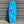 A light blue swirled pattern Mini hammer surfboard leaning against a sheet metal wall. Quad Fin Setup with White Future Fin Boxes. 