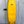 yellow mid length swallow tail surfboard