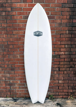 white shortboard swallow tail surfboard